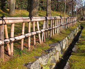 Image showing  Bamboo fence perspective in a Japanese garden