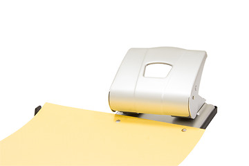 Image showing hole puncher at work isolated