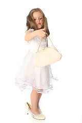 Image showing little girl evaluating theater bag