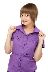 Image showing Young girl in violet blouse looks