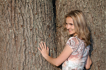 Image showing Girl on background of the oak