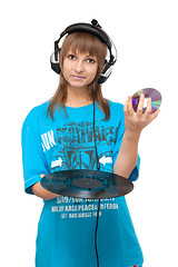 Image showing Girl with vinyl disk and DVD