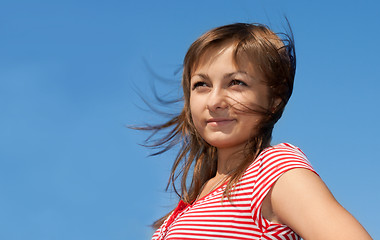 Image showing Girl on background blue sky