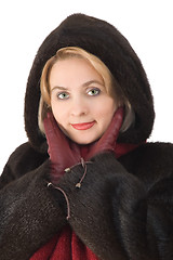 Image showing The beautiful woman in a fur-coat