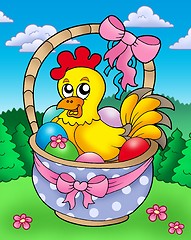 Image showing Easter basket with happy chicken