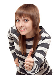 Image showing Young beautiful girl shows OK