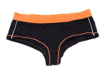 Image showing Feminine underclothes, black panties and orange band