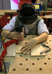 Image showing Man using power tool