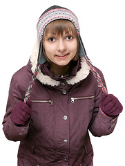 Image showing Young beautiful girl in winter to jacket and hat