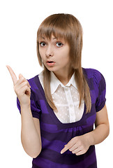 Image showing Young beautiful girl shows finger