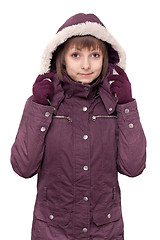 Image showing Girl in winter violet hooded jacket