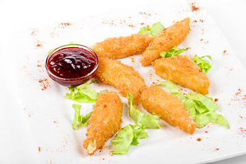 Image showing Baked cheese with cranberries sauce