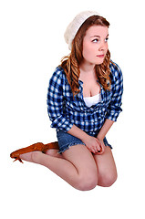 Image showing Girl sitting on floor. 