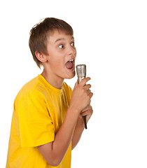 Image showing boy with microphone on white