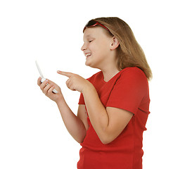 Image showing girl texting on mobile phone