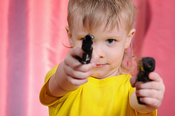 Image showing boy with pistol