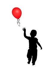 Image showing Child reaching for a balloon