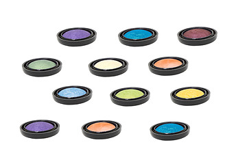 Image showing nine colored eyeshadows isolated in white