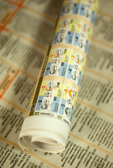 Image showing rolled newspaper