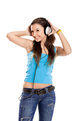 Image showing Young girl listen music