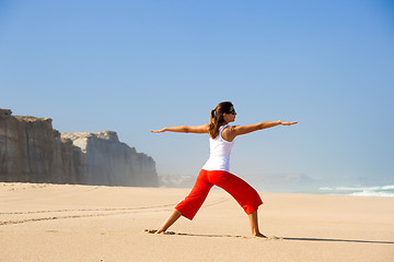 Image showing Young woman making Yoga