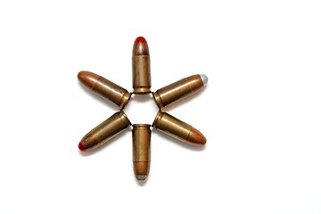 Image showing Six-pointed star made of 9mm Parabellum cartridges isolated