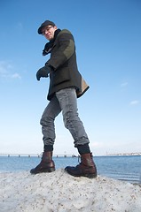 Image showing man walking on ice