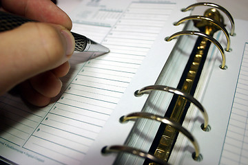 Image showing Hand writing in daily planner