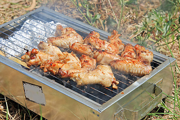 Image showing BBQ. Close up photo of cooking meet on the open fire