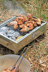 Image showing BBQ. Close up photo of cooking meet on the open fire