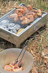 Image showing BBQ. Close up photo of cooking meet on the open fire