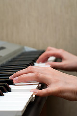 Image showing playing the piano