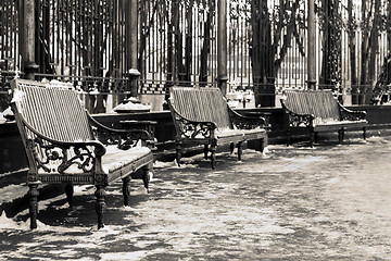 Image showing Three benches in a park