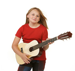 Image showing girl playing guitar on white