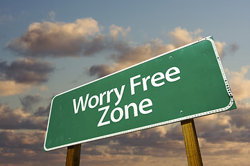 Image showing Worry Free Zone Green Road Sign and Clouds