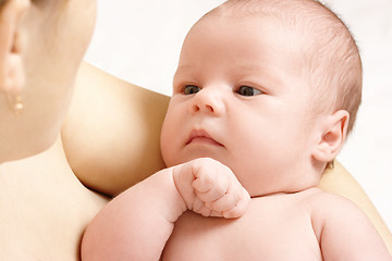 Image showing Adorable child is looking at mother