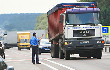 Image showing Policeman on the road