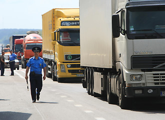 Image showing Policeman on the road