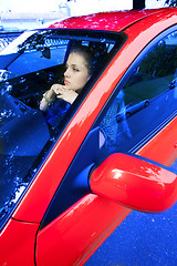 Image showing young woman in car