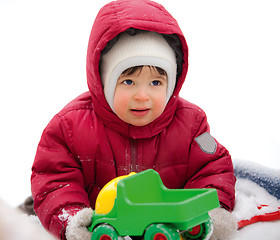 Image showing little kid in the red winter jacket