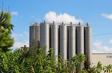 Image showing Twelve tower silos on chemical plant