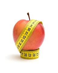 Image showing Red apple and measuring tape