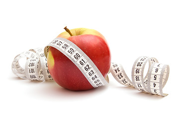 Image showing Red apple and measuring tape