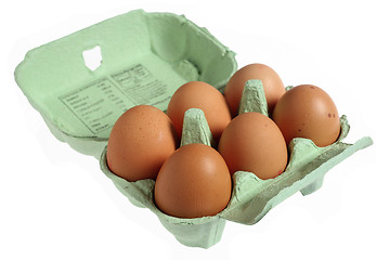 Image showing Six eggs in a papier mache egg box