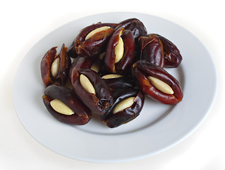 Image showing Almond stuffed dates on a plate