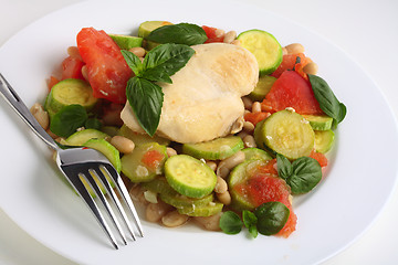 Image showing Italian chicken and vegetables with a fork