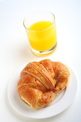 Image showing Croissant and juice vertical