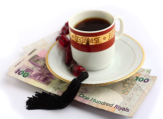 Image showing Coffee beads and cash