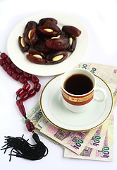 Image showing Coffee dates worry beads arab money