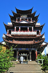 Image showing china Temples on sky and a monk